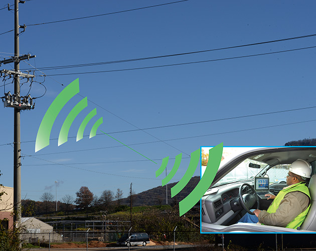 Operator inside a truck using laptop using Intellilink software to communicate with automation products software, automation software, intellilink setup software, windows based program interface